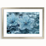 Abstract art print featuring a close-up frost design in silver and blue tones, framed with a silver mat.