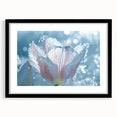 Abstract art print featuring a frost-like texture in vibrant blue and white tones, framed in black.