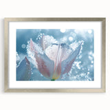 Abstract art print of frost patterns in silver frame, featuring cool blue and white tones, ideal for dining room decor.