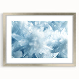 Abstract art print of frost patterns in cool gray and silver tones, framed with a silver mat.