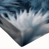 Black and white close-up of frost patterns on ice, printed on large stretched canvas, suitable for bedroom wall art.