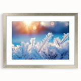 Abstract art print featuring frost-like patterns in muted white and gray tones on a framed silver mat.