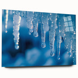 Close-up of frost patterns on acrylic glass, in muted blue and white tones.