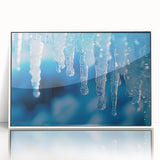 Large art print of a close-up ice frost design in muted blue and white tones on framed acrylic.