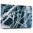 Acrylic glass print of a large abstract depiction of frost patterns in muted blue and white tones.