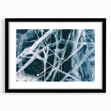 Extra large abstract art print featuring textured, colorful frost patterns, framed in black, ideal for living room decor.