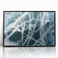 Framed acrylic print of a large abstract wall art featuring frost-like patterns in muted gray tones.