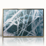 Mid-century modernist art depicting a frost design in gold and white tones on a framed acrylic.