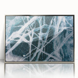 Framed acrylic print featuring a close-up of frost patterns in silver tones, suitable for modern art wall decor.