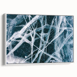 Framed canvas featuring a close-up of frost patterns in muted gray tones, ideal for bedroom wall art.