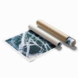Close-up image of frost patterns on ice in muted blue and white tones, printed on large rolled canvas.
