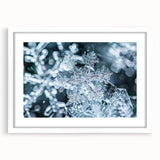 Extra large abstract art print featuring textured frost designs in cool blue and white tones on a framed canvas.