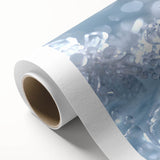 Art deco poster featuring close-up of frost patterns in muted blue and white tones on rolled canvas.