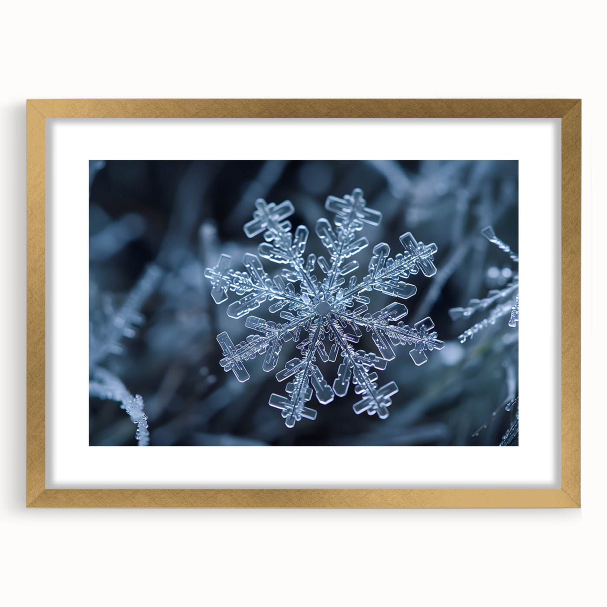 Textured art depicting abstract frost patterns in icy blue and white tones, presented in a gold frame with mat.