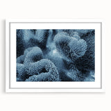 Abstract art print featuring a textured frost design in muted gray tones on a large framed canvas.