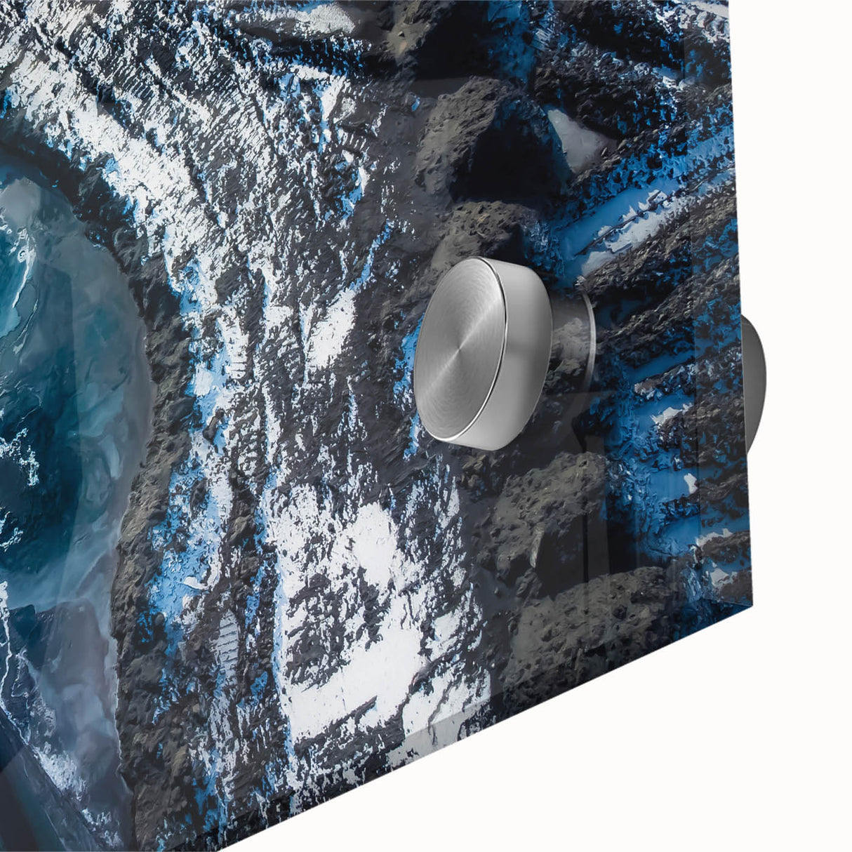 Close-up of frost patterns in blue and white on acrylic glass, ideal for dining room art in a mid-century modernist style.