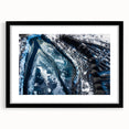 Abstract art print featuring a frost-like textured design in colorful hues, framed in black, ideal for living room decor.