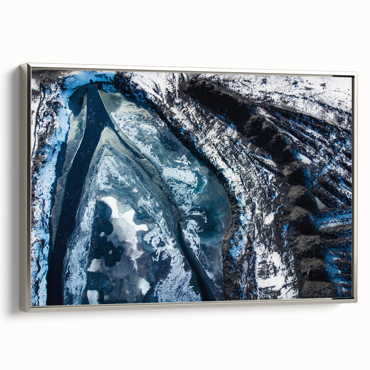 Vintage poster art featuring a close-up of frost patterns in black and colorful tones on a large framed canvas.
