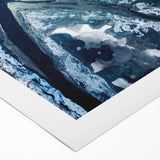 Art deco poster featuring a close-up of frost patterns in muted blue and white tones on rolled canvas.