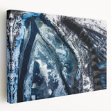 Close-up of frost patterns on ice in muted blue tones on a stretched canvas, suitable for kitchen wall art.