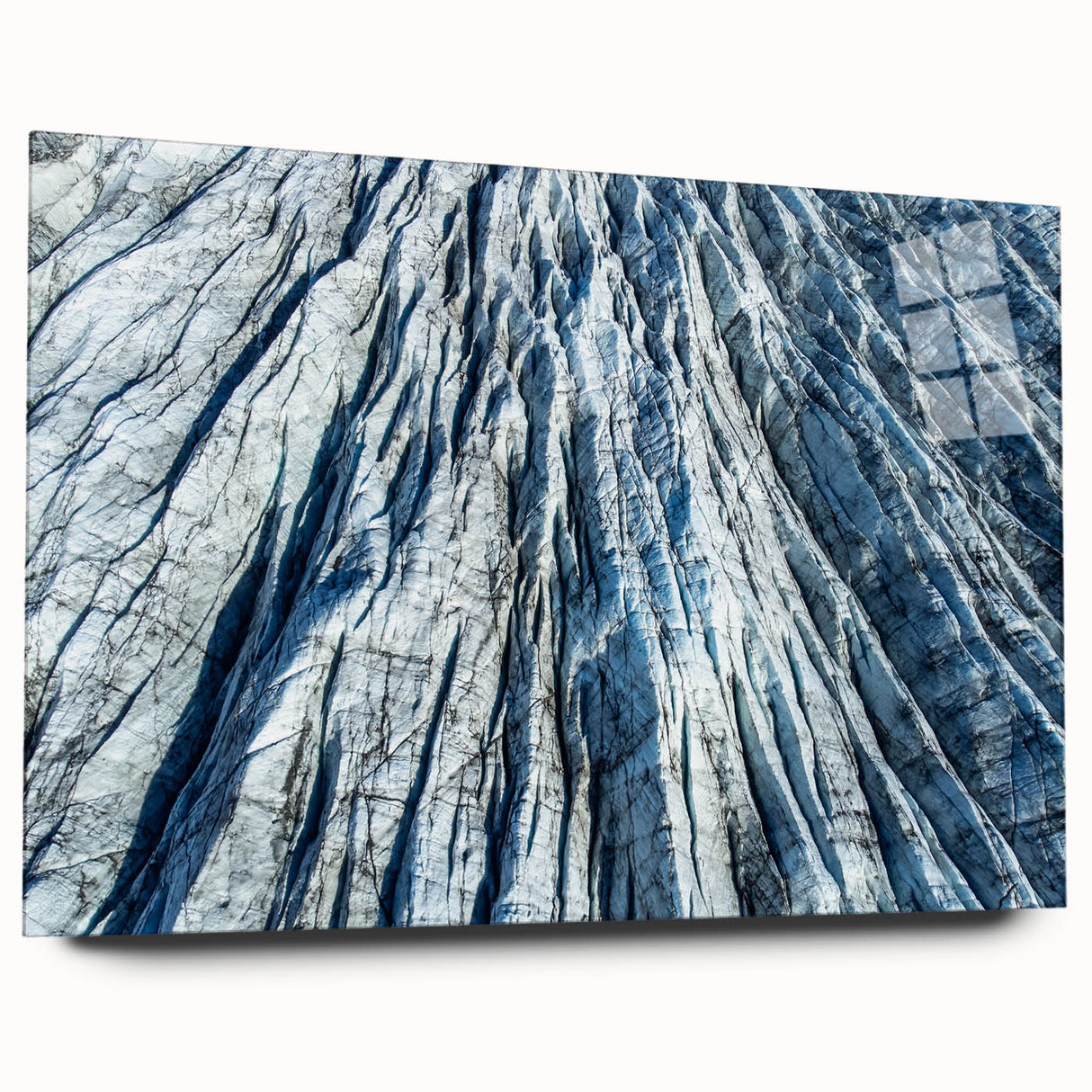 Close-up of frost patterns on acrylic, featuring cool blue and white tones, suitable as bedroom or dining room art.
