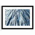 Abstract art print featuring a frost-like textured design in colorful hues, framed with a black mat.