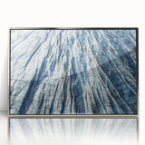 Framed acrylic print featuring a close-up of frost patterns in silver and gray tones, suitable for modern art wall decor.