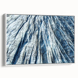 Framed canvas featuring a close-up of frost patterns in gray and white tones, suitable as wall art for bedroom.