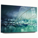 Close-up of leaves in green and brown tones on a large acrylic glass, ideal for bedroom or dining room art.