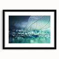 Extra large abstract art print of colorful, textured leaves, framed in black, ideal for living room decor.