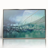 Mid-century modernist art depicting close-up of leaves in muted green and silver hues, framed acrylic.