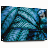 Close-up of leaves in green and yellow hues on acrylic glass, suitable for dining room decor.