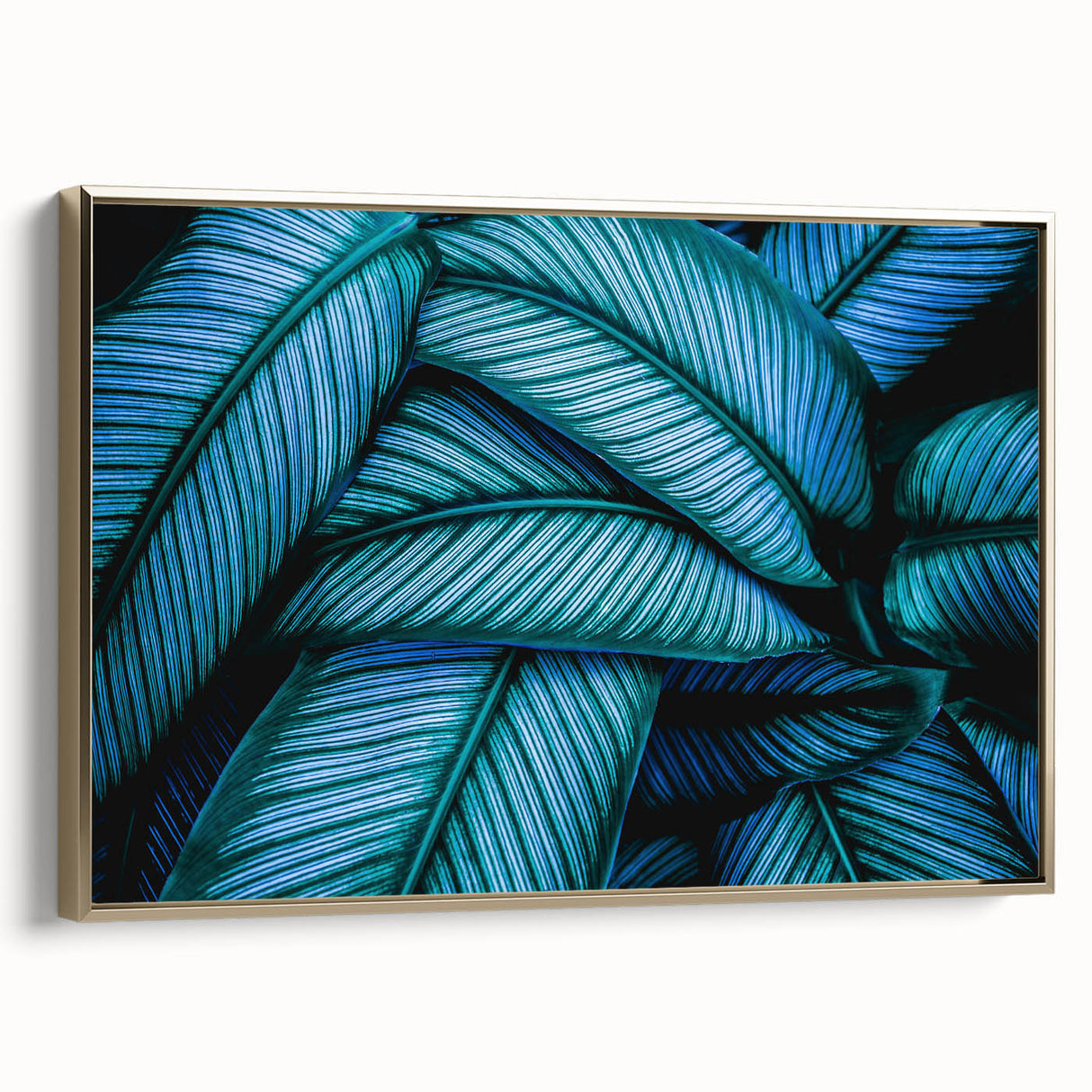 Framed canvas featuring close-up of leaves in muted green and gold, ideal for bedroom wall art.