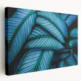 Close-up image of green leaves on a stretched canvas, ideal for kitchen wall art.