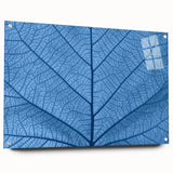 Close-up of green leaves printed on acrylic glass, featuring detailed textures and natural tones.