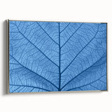 Framed canvas featuring a close-up of leaves in vibrant green and yellow, ideal for adding a touch of nature to any room.