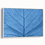 Vintage poster art of colorful leaves on a large framed canvas, ideal for living room decor.