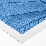 Art deco poster of close-up leaves in green and yellow tones on rolled canvas, suitable for dining room wall art.