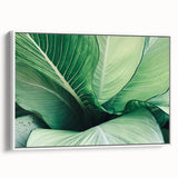 Framed canvas featuring a close-up of colorful leaves in a vintage poster style, suitable for living room decor.