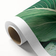 Art deco poster featuring close-up of leaves in green and yellow tones on rolled canvas, ideal for nursery wall art.