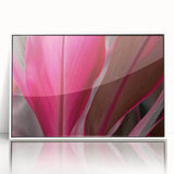 Close-up of green leaves on a white acrylic print framed in white, suitable for modern nursery decor.