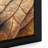Close-up of textured black wall art featuring colorful leaves, framed canvas, ideal for living room decor.