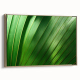 Framed canvas of a close-up leaf design in gold, ideal for bedroom wall art with a vintage poster feel.