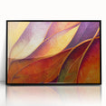Large abstract wall art featuring close-up leaves in black and white, framed in black acrylic.