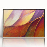 Mid-century modernist art of silver-framed acrylic print featuring close-ups of leaves in muted green tones.