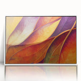 Acrylic print of close-up leaves in green and yellow tones, framed in white, suitable for nursery wall art.