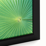 Close-up of textured leaves in black, with vivid color accents on a large framed canvas, suitable for living room decor.
