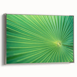 Framed canvas featuring a close-up of leaves in vibrant green and yellow tones, ideal for enhancing a living room or study.