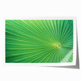 Close-up of green leaves on a rolled canvas print, with a naturalistic style.
