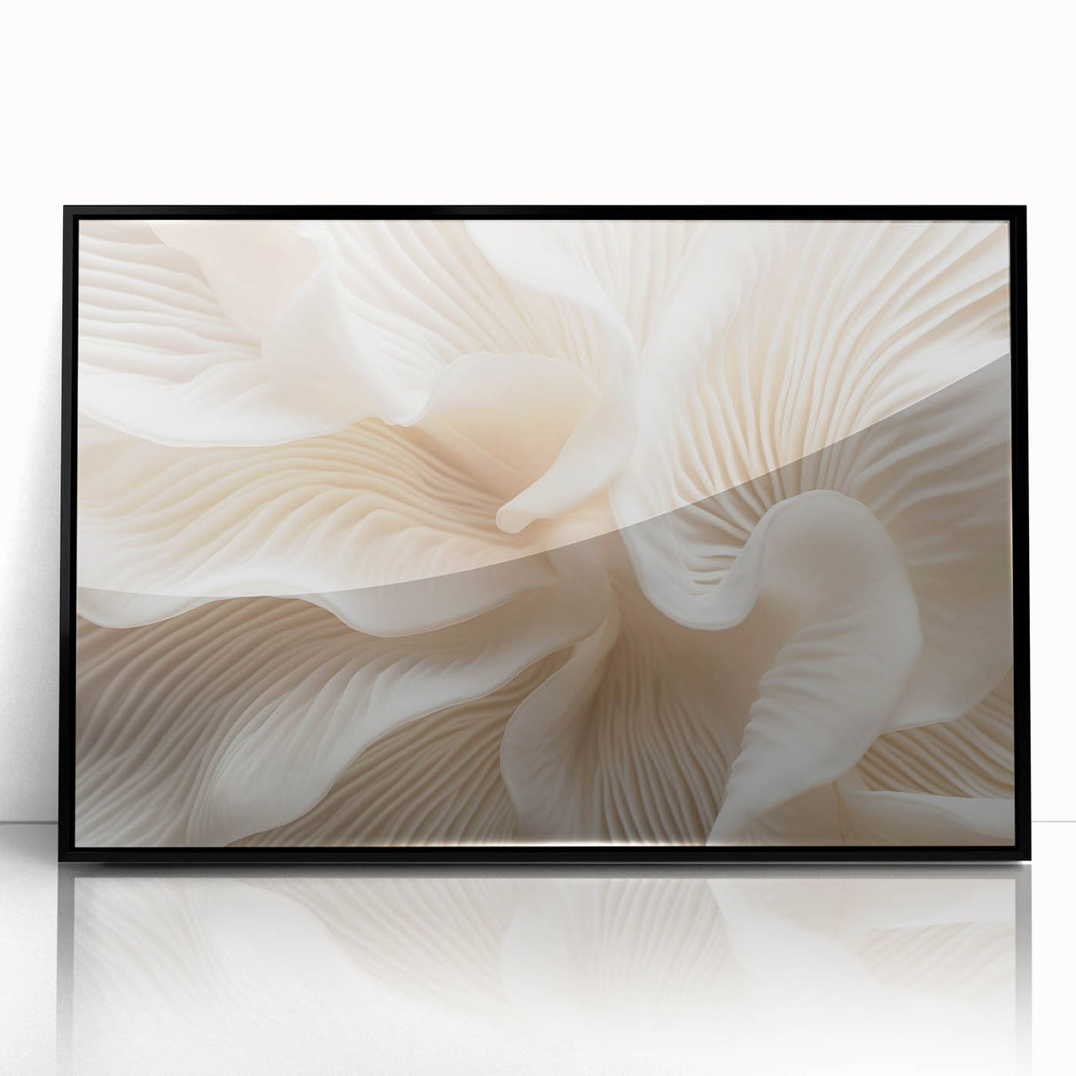 Large abstract wall art featuring close-up leaves in green tones, framed in black acrylic.